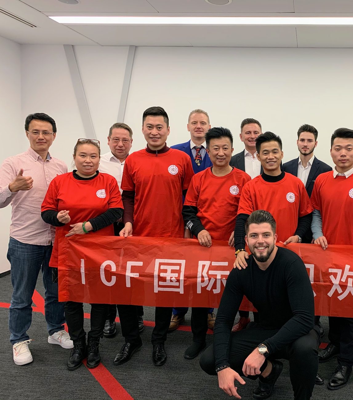 Igor Haleta with a Chinese crypto delegation under an ICF banner